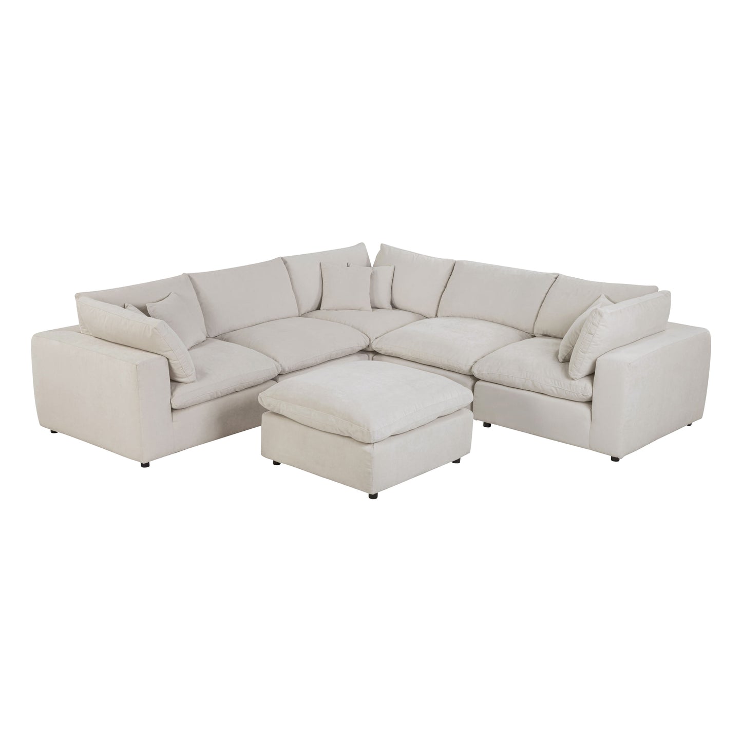 Alvora modular sofa in Ivory arranged with a matching ottoman