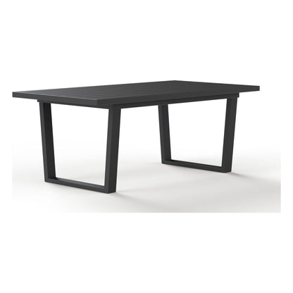 Angled view of the Monarch slatted aluminum dining table